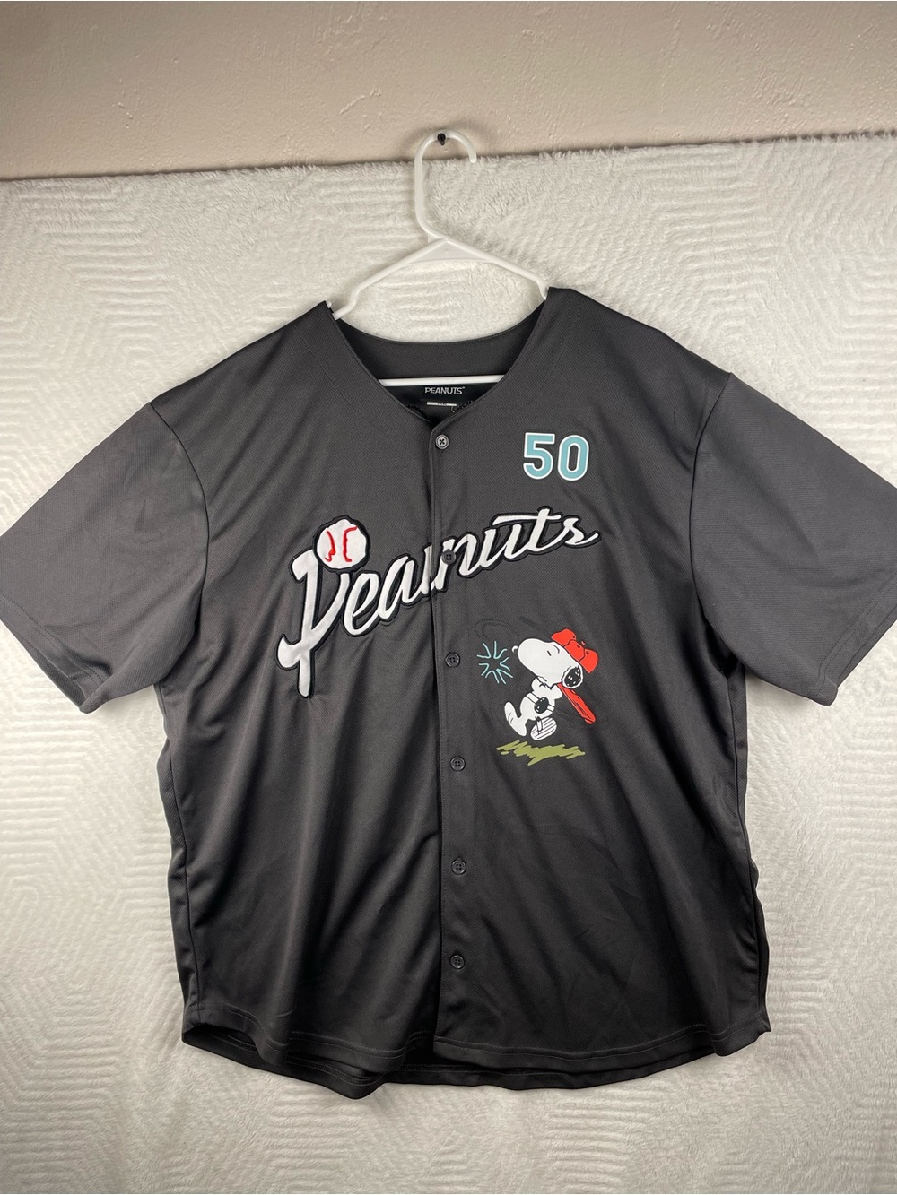 Peanuts Men's Black Baseball Jersey with Snoopy Graphic and Teal Number